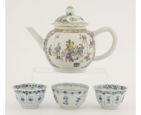 A Chinese export teapot and cover, 18th century, painted with officials gathered together to share a drink, a pair of blue an