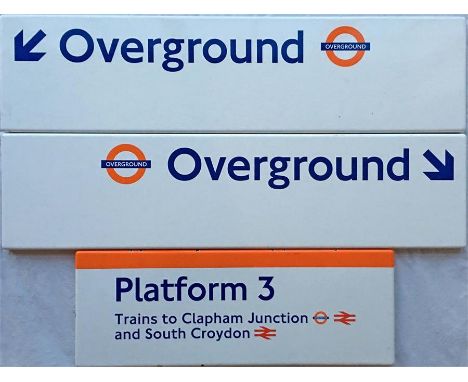 Selection (3) of London Overground fully flanged ENAMEL SIGNS, each featuring the Overground roundel, comprising 2 x directio