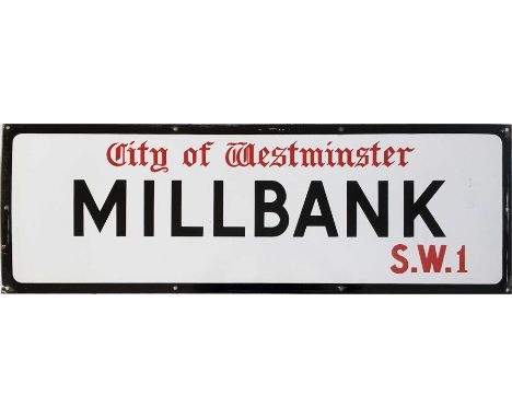 A City of Westminster enamel STREET SIGN from Millbank, SW1 which runs alongside the Thames down from the Houses of Parliamen