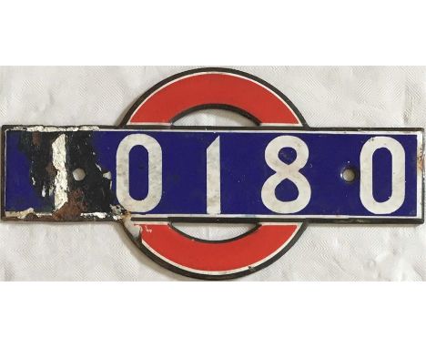 London Underground enamel 'bullseye' STOCK-NUMBER PLATE from 1938 tube stock driving motor car 10180. These plates were fitte