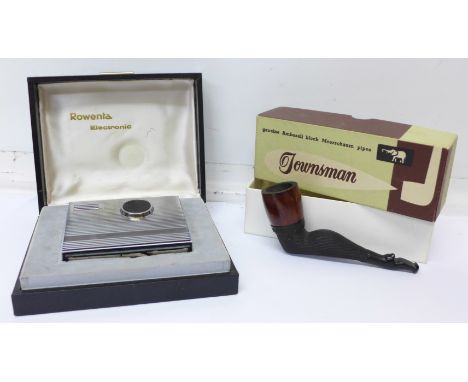 A Meerschaum pipe and a Rowenta Electronic lighter, both boxed
