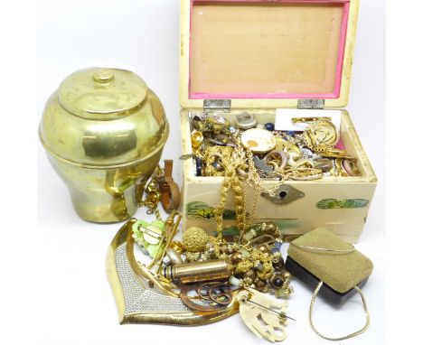 Costume jewellery and a brass Lipton Tea caddy