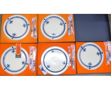 Five Rosenthal plates and cutlery, individually boxed