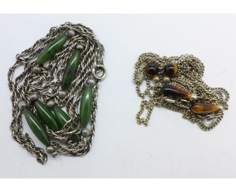 A jade and silver chain and two silver and tiger's eye chains, 27.6g