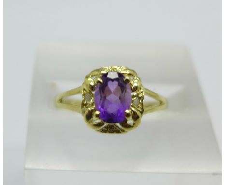 A 9ct gold, amethyst and diamond ring, 1.2g, N