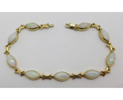 A 9ct gold and opal bracelet, 9.3g, 18cm