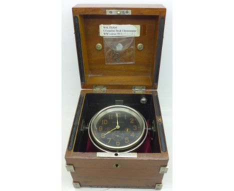 A Waltham WWI period US Marine deck&nbsp; 8-day clock in a walnut case with key