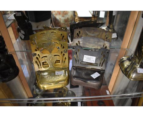 A pair of desk stands in brass, one has an inkwell and the other has a stamp compartment&nbsp;