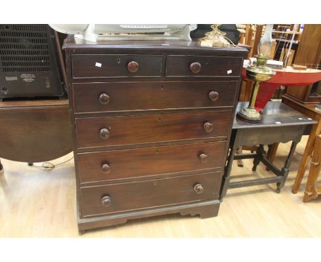 Dark mahogany Georgian chest of two above four drawers with inlayed banding and lamp detail to top with knob handles on brack