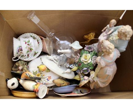 A mixed collection of ceramics to include Beswick, Wedgwood, Parian Ware, Royal Albert and Worcester