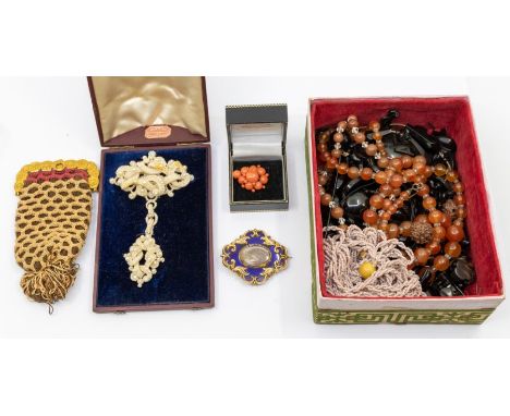 A collection of Victorian mourning jewellery to include a yellow metal brooch with scrolled border inset with blue enamel and