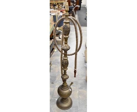 A collection of metal wares including North African pots, teapots, hash, floor standing pipe, plated and brass wares includin