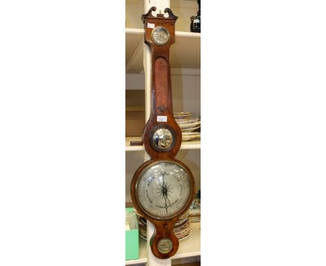 A Victorian banjo barometer by Caminada Manchester, thermometer detached but present