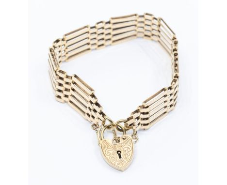 A 9ct gold five bar gate bracelet, width approx. 15mm, length approx. 7'', with padlock clasp, weight approx. 21gmsCondition 