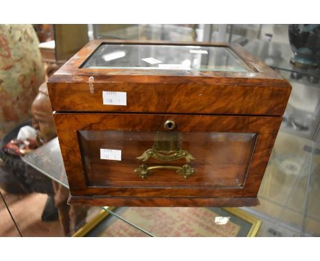 A rose mahogany bevelled glass top jewellery box, 19th Century, with lift up top, drop down glass front concealing single tri