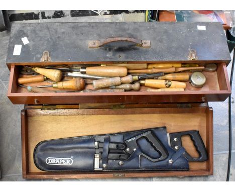 Coach carpenters tool box containing wooden handled tools, wooden plains and other precise coach making tools