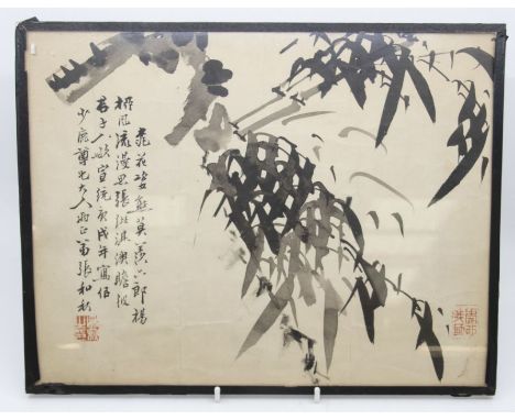 A Chinese ink and wash drawing of bamboo, with Chinese script and red seal marks, approx 28cm x 36cm