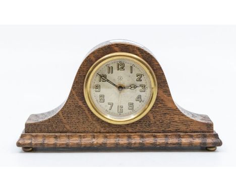 Small mantle/bedside clock in oak case, and alarm, 2" dial