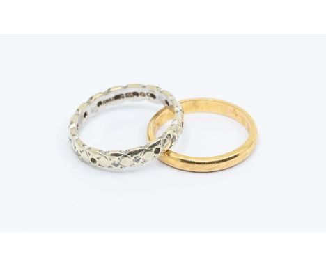 A 22ct gold wedding band, size K, weight approx 3gms along with a 9ct white gold and diamond set band, some diamonds missing,