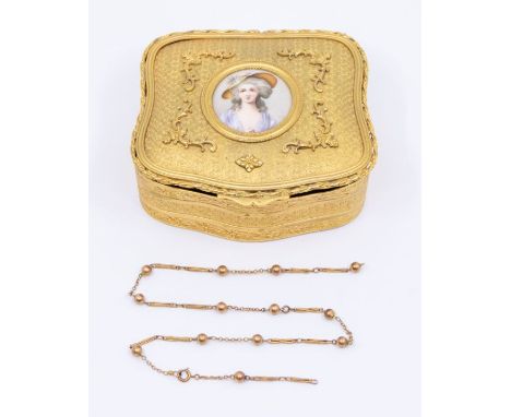 A French gilt metal cartouche shaped jewellery box and cover, the cover inset with porcelain portrait of a Lady, the cover ap