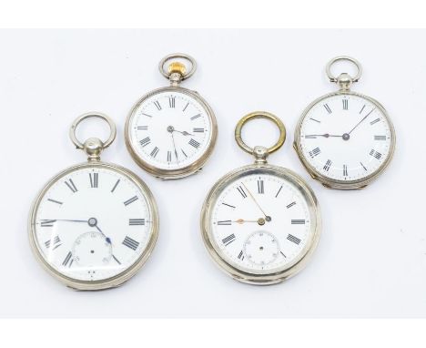 Two large sterling silver cased pocket watches and two Continental silver cased pocket watches, all with white enamel dials a