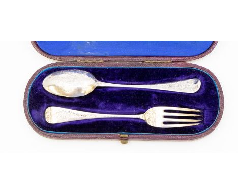 A Victorian silver Christening set comprising fork and spoon, profusely engraved foliate decoration, each handle engraved MAB