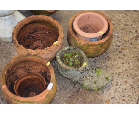 Mixed lot of various terracotta pots together with a composite planter modelled as a boot