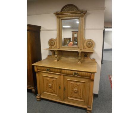 An early 20th century light oak mirror backed sideboard, width 128 cm 