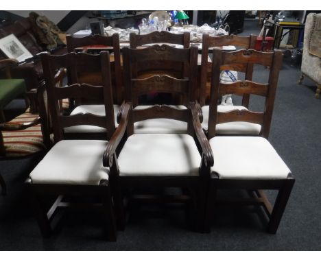 A set of six hardwood ladder back dining chairs 