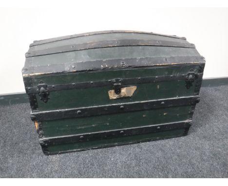 An oak bound domed topped trunk 