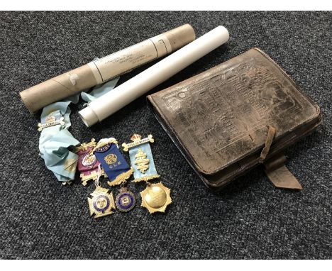 Three sterling silver Grand Lodge Masonic medals, with certificates, small sash with badges and a vintage leather case 