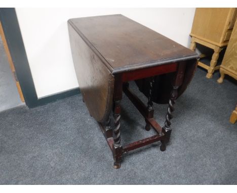 An oak barley twist gate leg table 