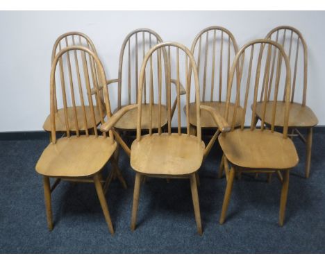 Seven Ercol elm spindle back dining chairs (5 + 2)