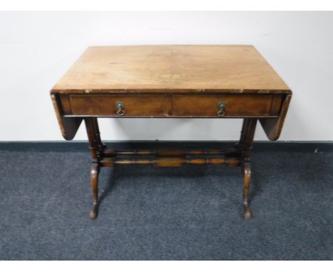 An antique walnut sofa table  CONDITION REPORT: Veneer lifting and numerous minor veneer losses. Frame rather wobbly. 92cm wi