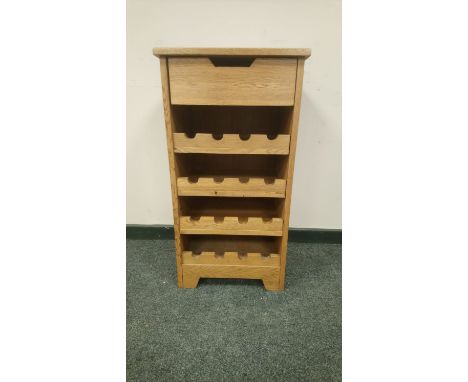 A contemporary light oak bottle rack, width 45.5 cm 