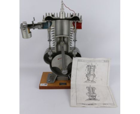 Irwin & Partners cast alloy cut-away demonstration model of a Four Stroke Engine Type EG 188.54.30, with carburettor, on wood