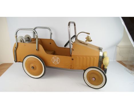 Child's pedal car, in the form of a 1938 fire engine, the bonnet with bell bracket with 'F.D', logo L100cm    Condition Repor