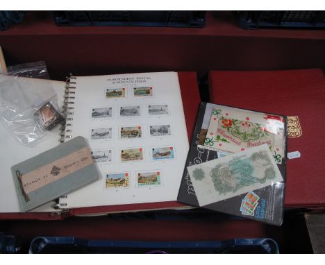 A Mixed Collection of GB and World Stamps, including Vatican in a small album, a few Swiss stamps including SG 67 in a small 