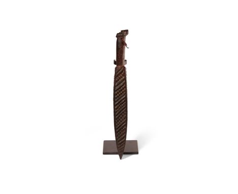 MAORI BLUDGEON, PATUKI NEW ZEALAND carved wood, handle with head terminal carved with moko, of square section tapering to a p