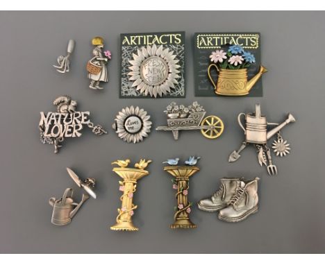 Ten Jonette Jewelry gardening pin brooches, some with hanging charms, with three pin badges, including gardening tools, fount