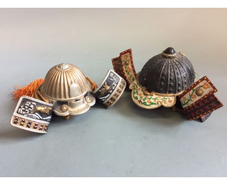 Two cold painted metal Kabuto samurai helmet ornaments. IMPORTANT: Online viewing and bidding only. No in person collections,