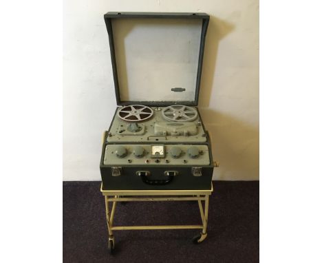 A Ferrograph tape to tape recorder on metal trolley base. IMPORTANT: Online viewing and bidding only. No in person collection