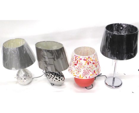 *Four as new table lamps, to include a coral coloured base with floral shade, two metallic type lamps and shades and a chrome