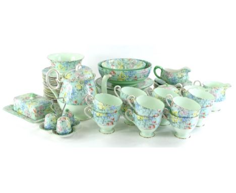 A Shelley Melody pattern part service, to include bowl 20cm diameter, teapot and cover, cruet, preserve jar and cover, cups, 