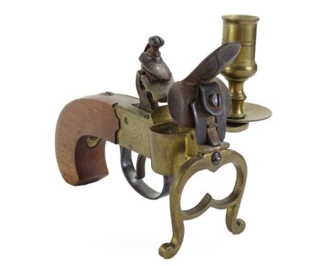 A brass and mahogany flint lock lighter, with integral candle arm, with circular drip pan etc., 14cm L.