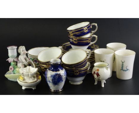 Miscellaneous porcelain items, to include a German porcelain chamber candle stick, a part tea service stamped Maple and Co Lo