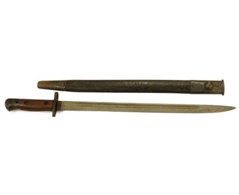 An early 20thC bayonet and scabbard, the handle stamped O.T.C, AMP37, 58cm L.