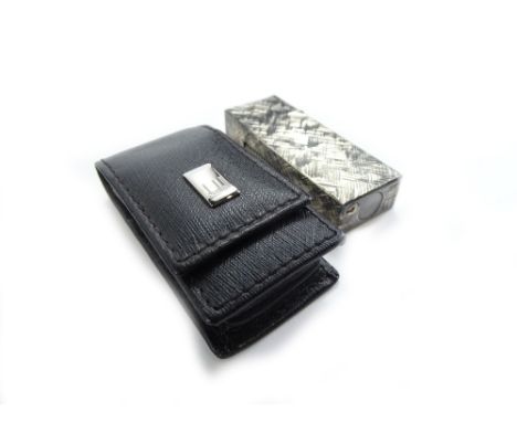 Two Dunhill London items, to include a Dunhill lighter, and a Dunhill leather small case, in presentation box.