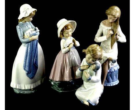 Various Nao figurines, to include a girl holding a puppy, one brushing her hair, one with a bunch of flowers and the other wi
