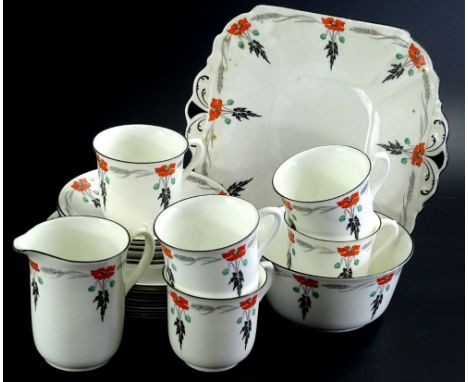 A Shelley part tea service, decorated with a design of poppies in red, green and black, pattern number 11326.
